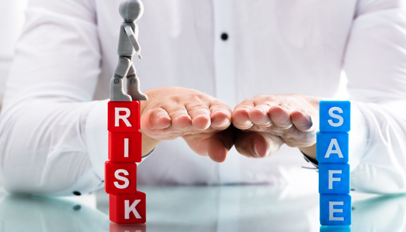 Person assisting human figure while moving from risk to safe